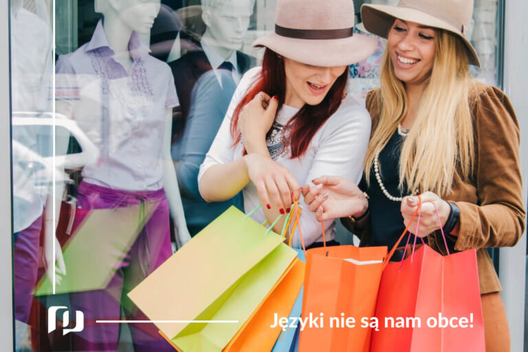 dwie uśmiechnięte dziewczyny w kapeluszach na zakupach w Paryżu trzymają kolorowe torby zakupowe nauka języka francuskiego przydatne zwroty w sklepie Preston Publishing