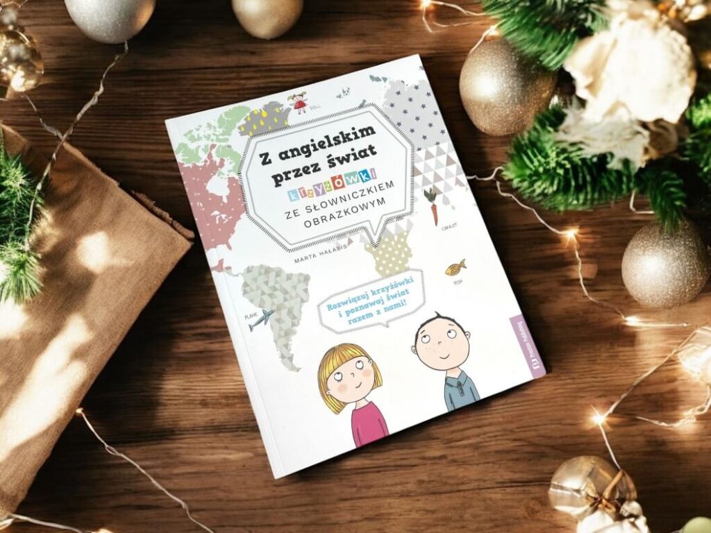 książka dla dzieci Z angielskim przez świat krzyżówki i słownictwo Preston Publishing na tle świątecznym