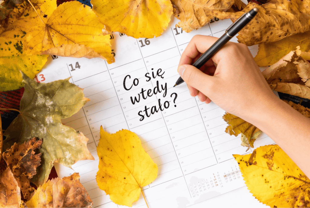 kalendarz otoczony żółtymi liśćmi i ręką pisząca w nim napis co się wtedy stało nauka języka hiszpańskiego czas przeszły preterito imperfecto Preston Publishing